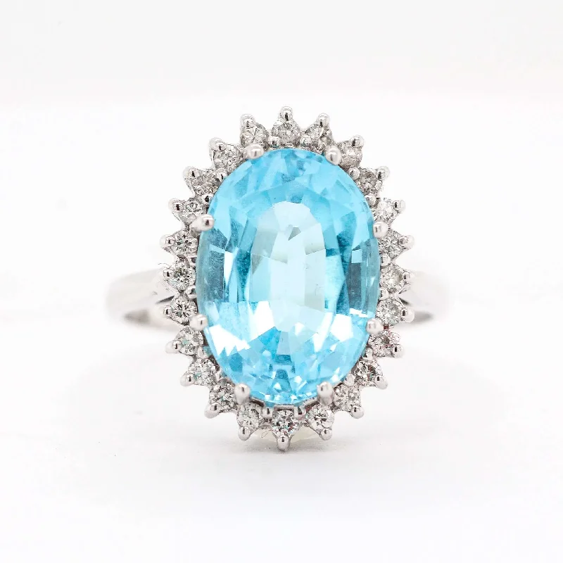 14KW 8.50 CT BLUE TOPAZ AND DIAMOND RING .50 CTTW