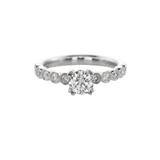 ROUND DIAMOND RING WITH BEZEL SET DIAMONDS DOWN THE SHANK 1.00CT TW