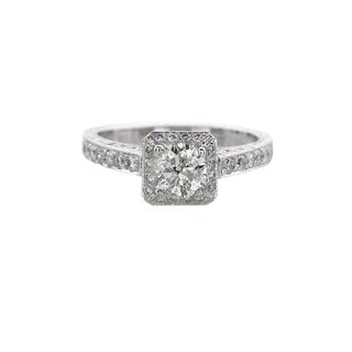 ROUND DIAMOND RING WITH DIAMONDS THROUGHOUT BEZEL AND SHANK