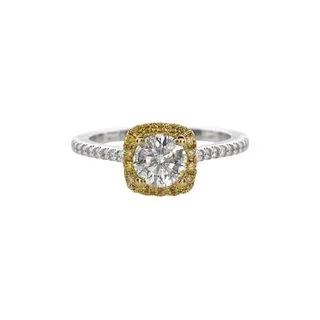 ROUND DIAMOND RING WITH FANCY YELLOW DIAMOND BEZEL AND DIAMONDS DOWN SHANK