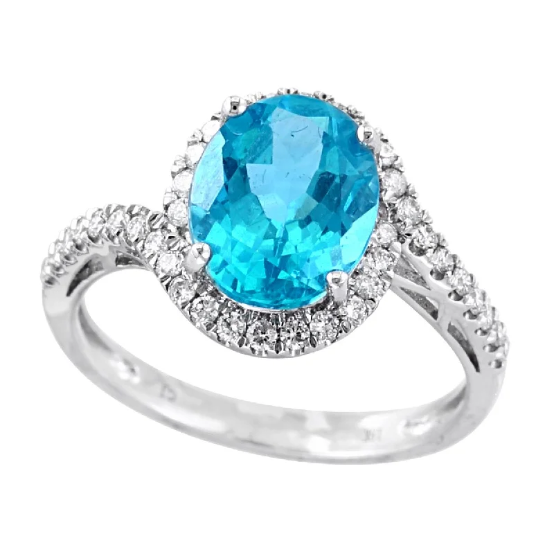 WHITE GOLD FASHIN RING WITH OVAL CUT APATITE AND DIAMOND HALO, .26 CT TW