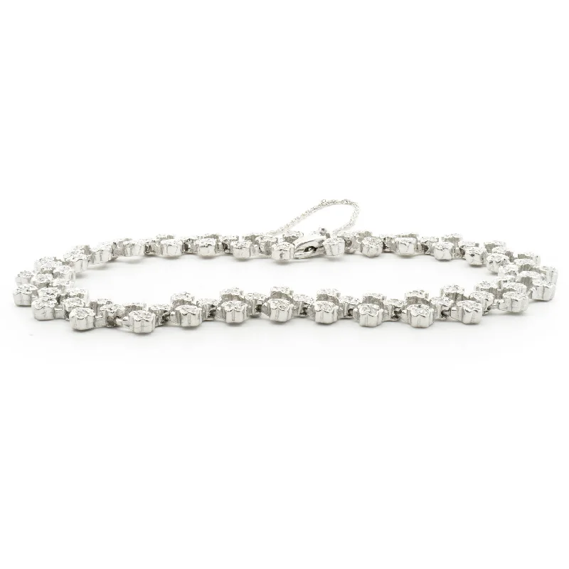 14 Karat White Gold Diamond Flower Linked Bracelet